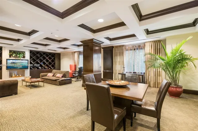 a view of residential building with outdoor space and lake view