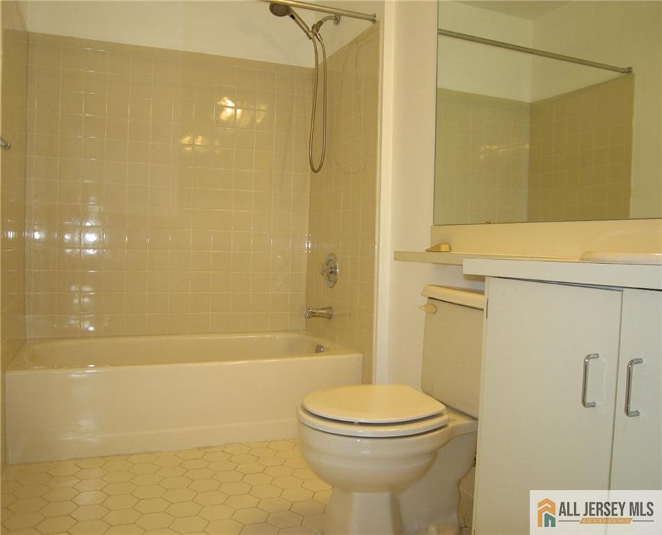 152 Darwin Lane North Brunswick, NJ 08902 - Photo 12 of 14 a bathroom with a toilet and shower