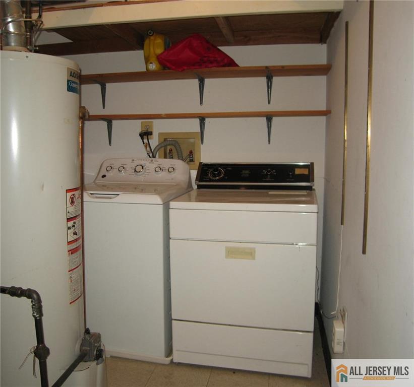 152 Darwin Lane North Brunswick, NJ 08902 - Photo 14 of 14 a utility room with dryer and washer