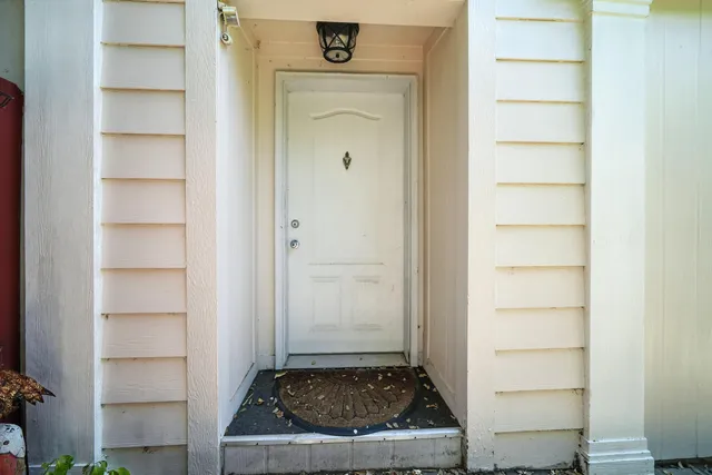 a living room with storage and utility