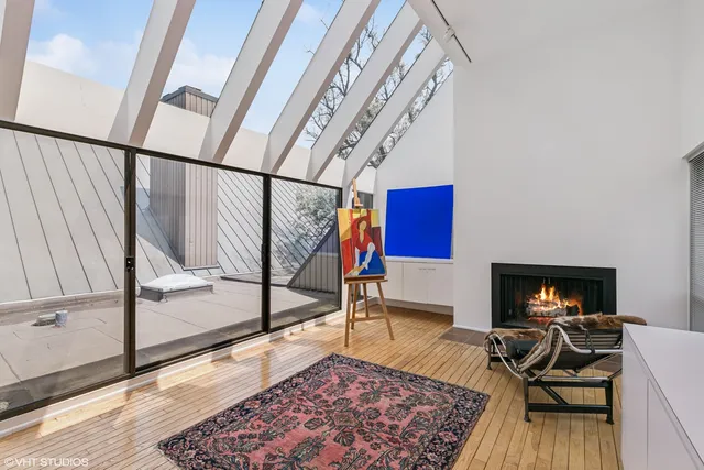 a bathroom with a granite countertop sink mirror and toilet