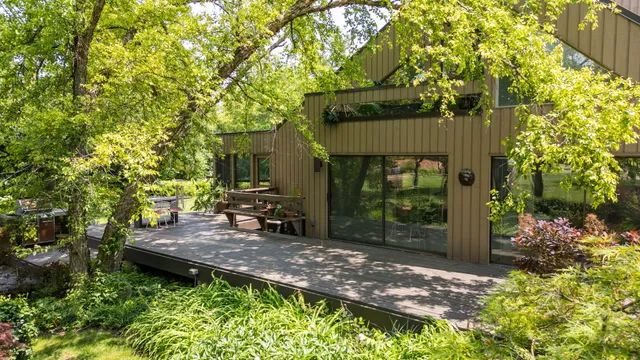 a view of swimming pool with chairs