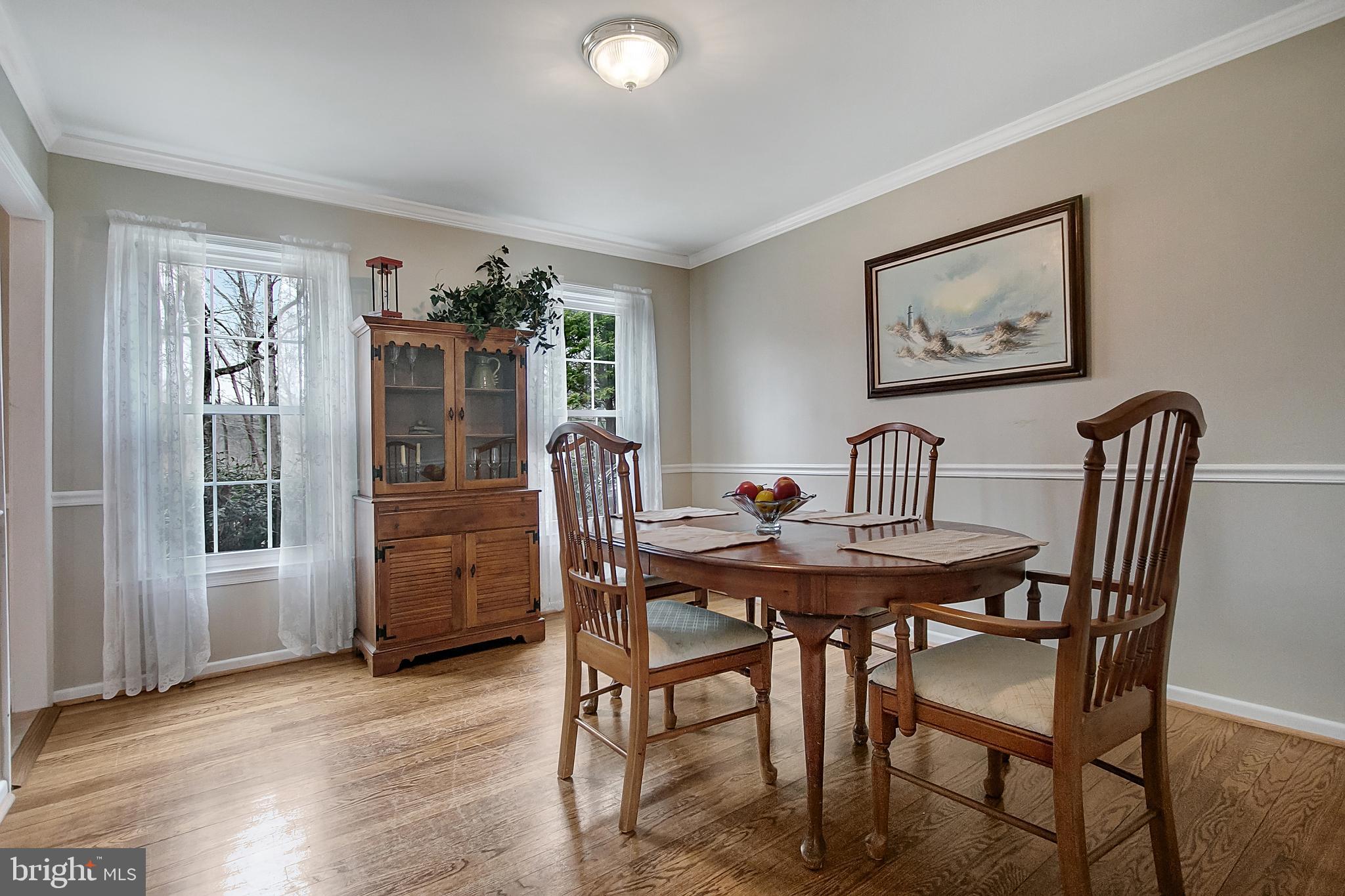 8323 Cushing Court Springfield, VA 22153 - Photo 14 of 37 Formal Dining Room w/Hardwood Floors/Chair Rail