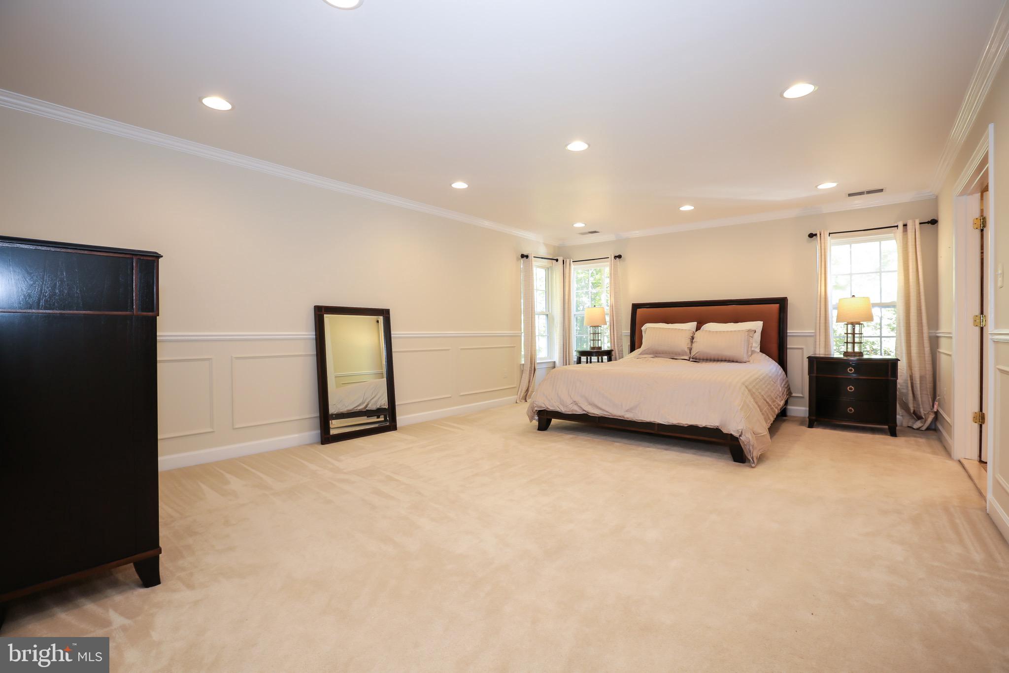 16013 Roland Park Place Gainesville, VA 20155 - Photo 14 of 31 Master Bedroom with Gorgeous Wainscoting