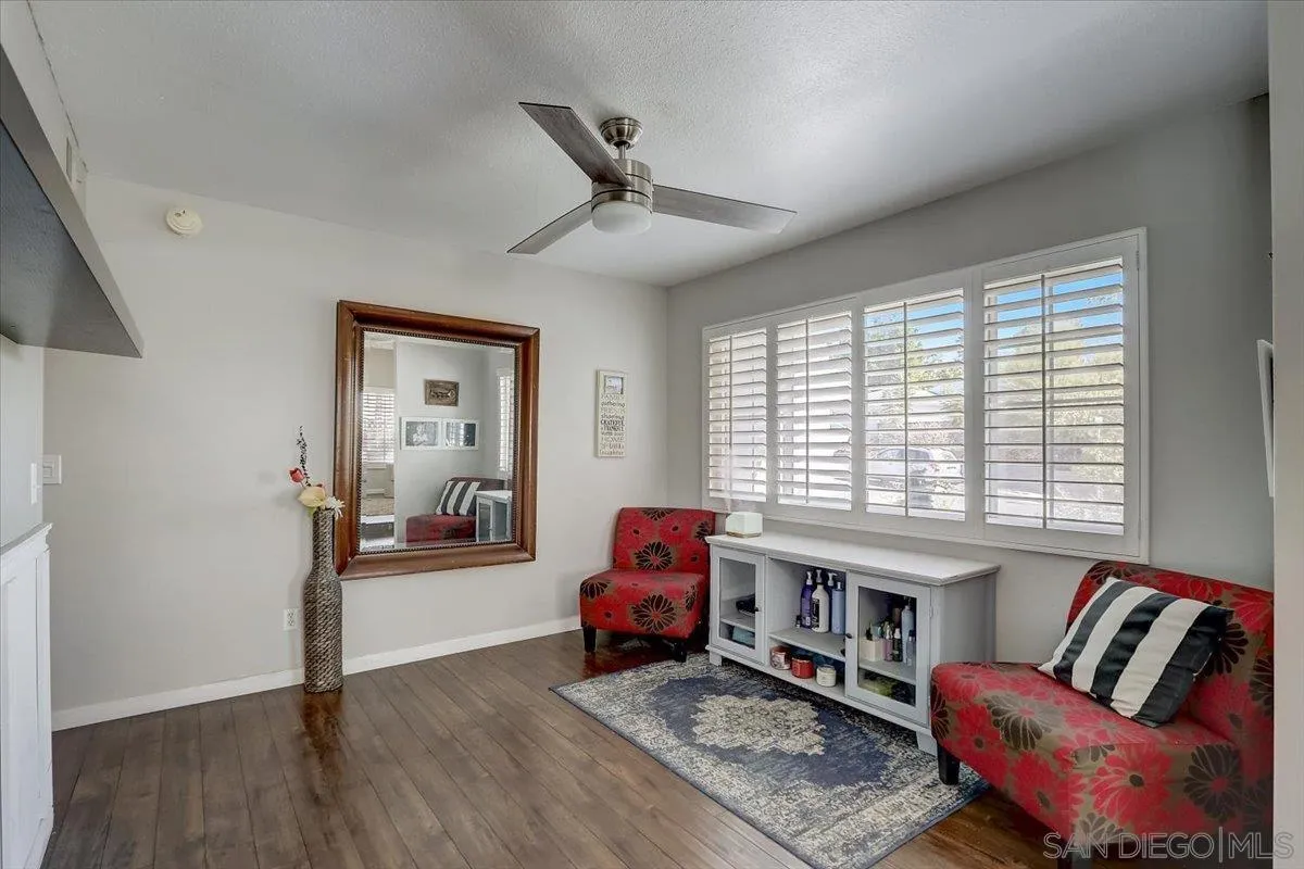4094 Tambor Road San Diego, CA 92124 - Photo 12 of 49 a living room with furniture and wooden floor