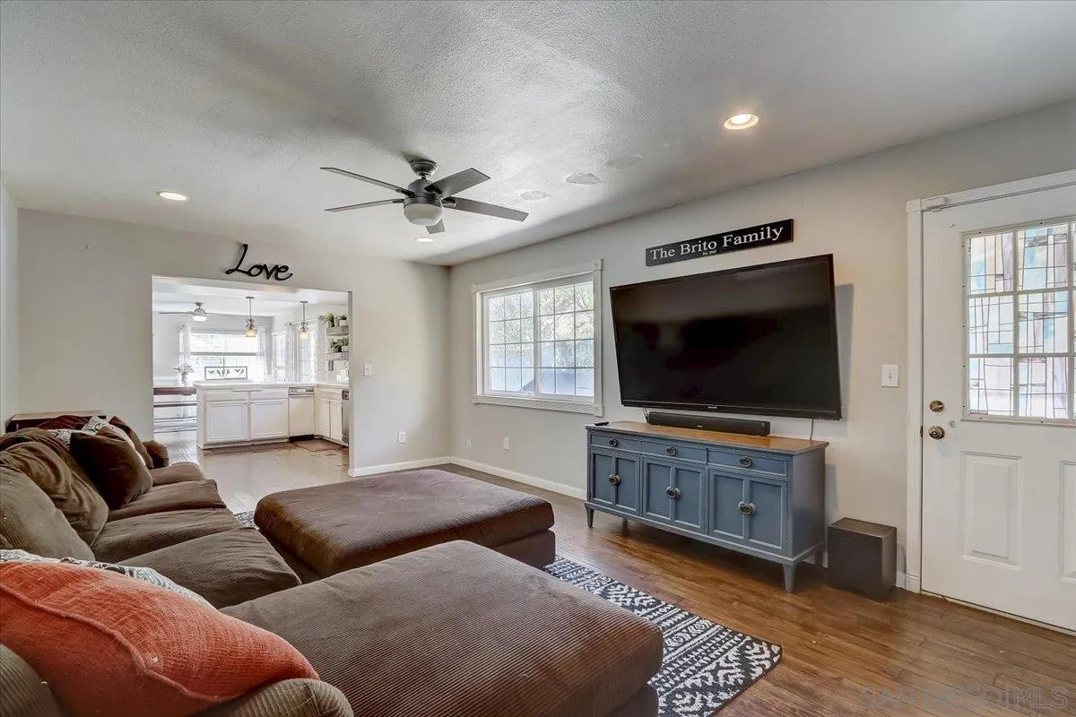 4094 Tambor Road San Diego, CA 92124 - Photo 22 of 49 a living room with furniture and a flat screen tv