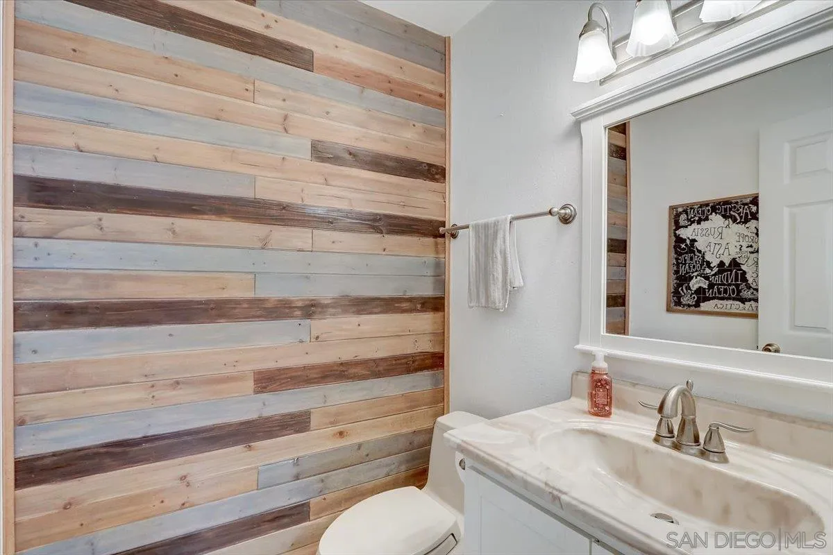 4094 Tambor Road San Diego, CA 92124 - Photo 24 of 49 a bathroom with a sink and a mirror