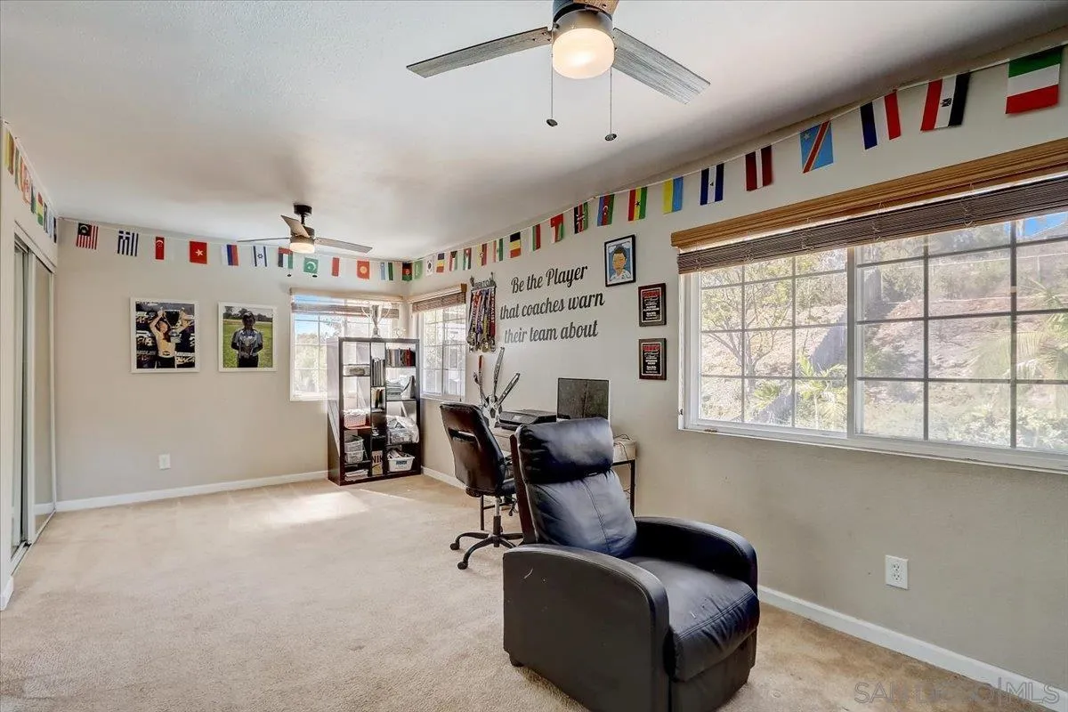 4094 Tambor Road San Diego, CA 92124 - Photo 32 of 49 a view of a workspace with furniture and a window