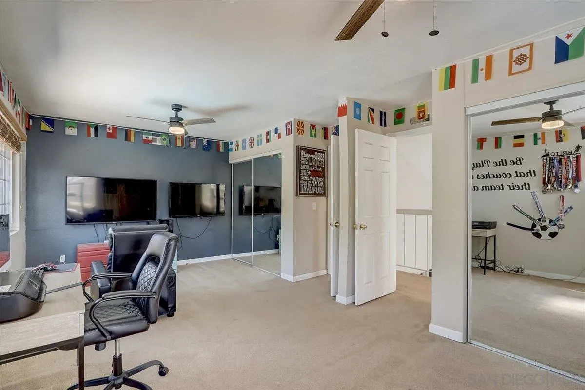 4094 Tambor Road San Diego, CA 92124 - Photo 33 of 49 a living room with furniture and a flat screen tv