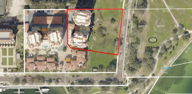 a bathroom with a glass shower door and a sink