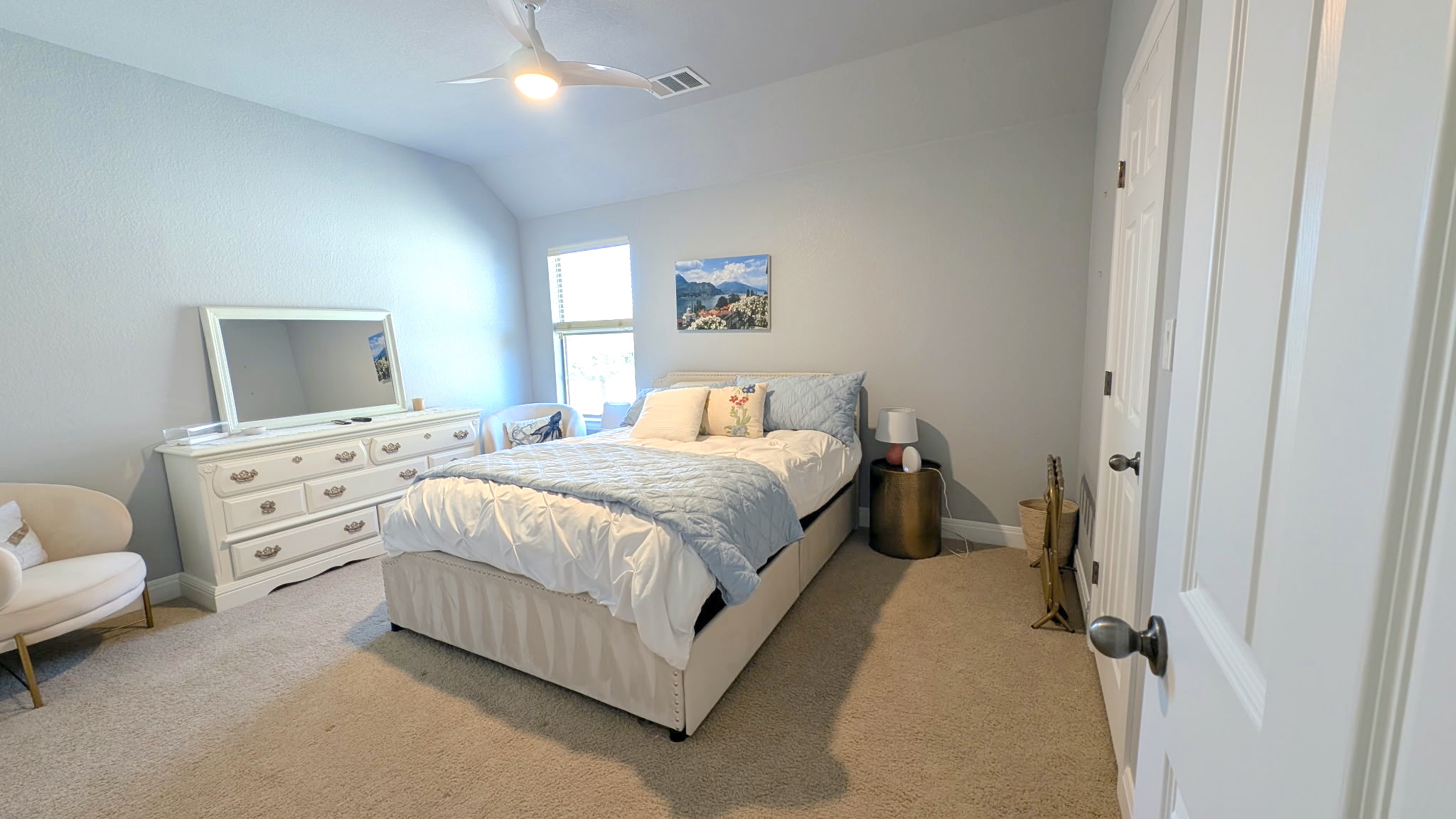 4205 Vail Divide Bee Cave, TX 78738 - Photo 17 of 28 Bedroom featuring lofted ceiling, light colored carpet, and a ceiling fan