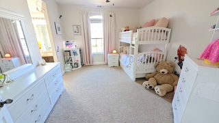 4205 Vail Divide Bee Cave, TX 78738 - Photo 19 of 28 Bedroom featuring light carpet and ceiling fan