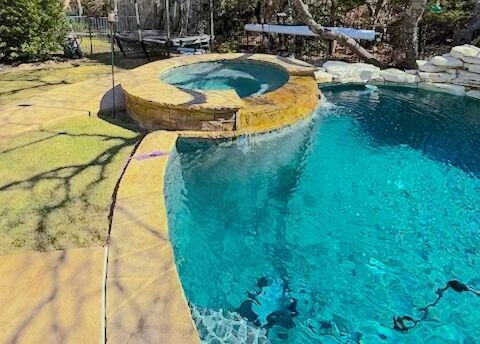 4205 Vail Divide Bee Cave, TX 78738 - Photo 2 of 28 The sparking pool and relaxing spa jacuzzi create a retreat that backs to a peaceful green space