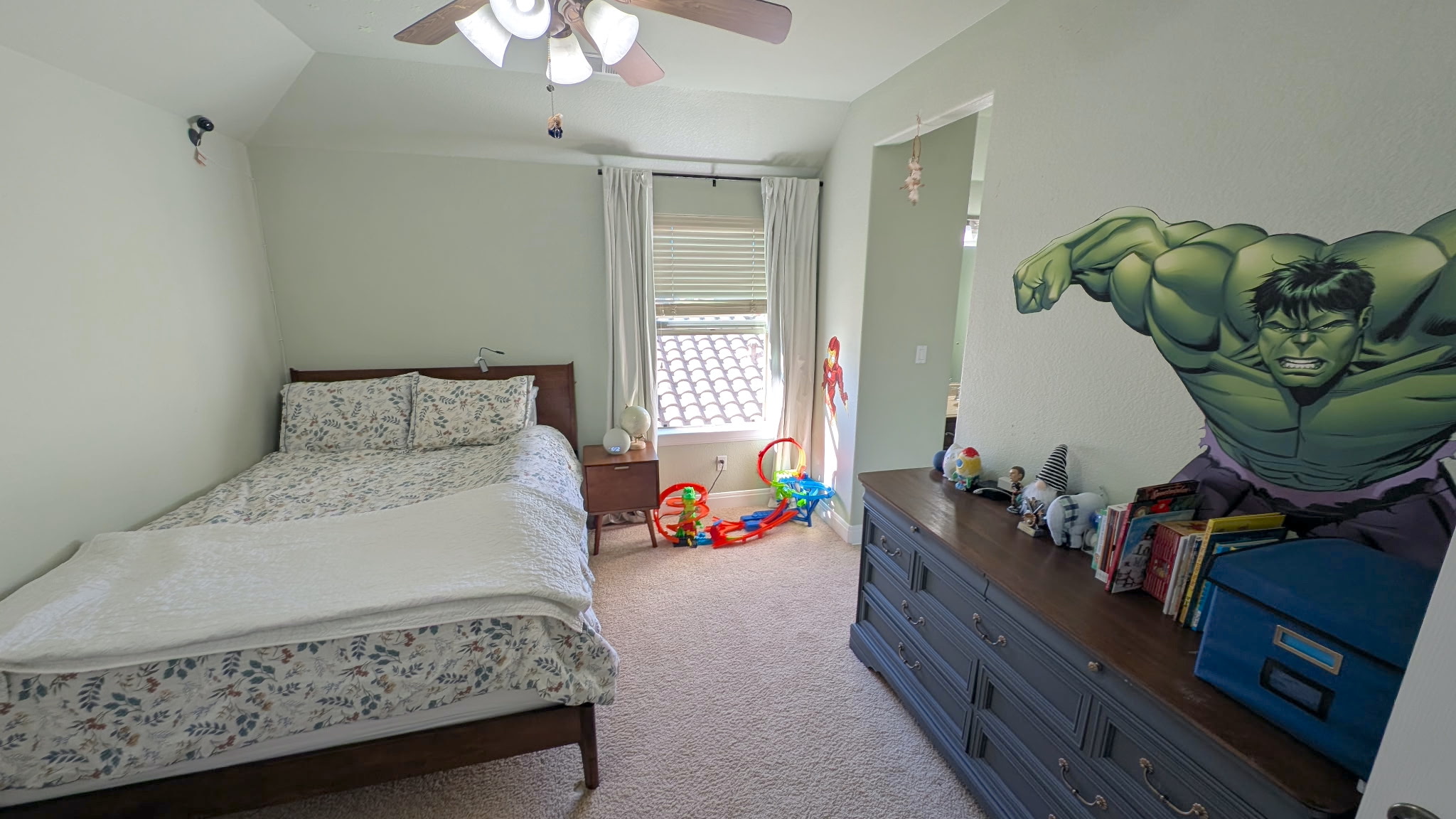 4205 Vail Divide Bee Cave, TX 78738 - Photo 21 of 28 Bedroom with light carpet, vaulted ceiling, and a ceiling fan