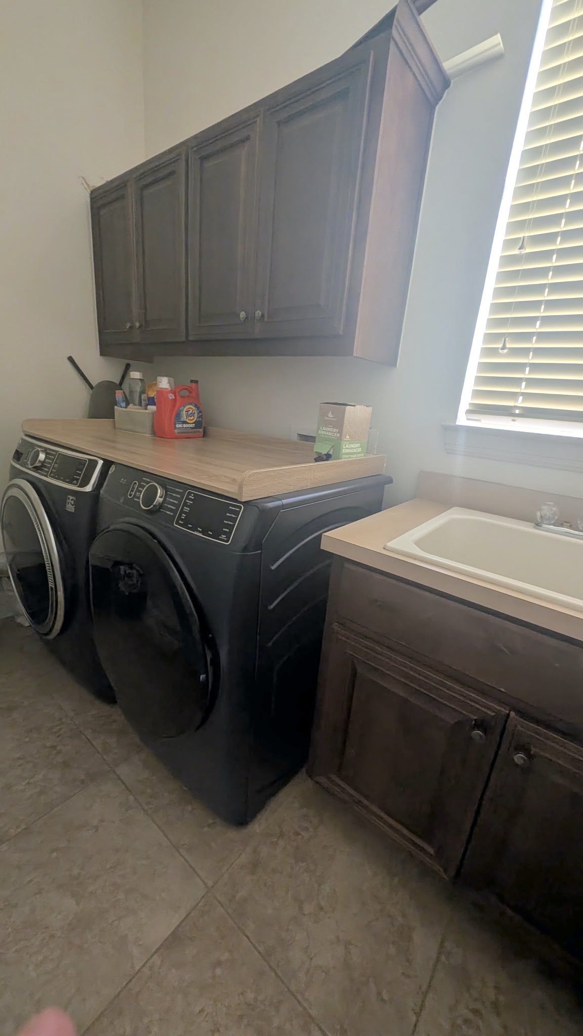 4205 Vail Divide Bee Cave, TX 78738 - Photo 22 of 28 Laundry area with cabinet space, a sink and washer/dryer hook ups
