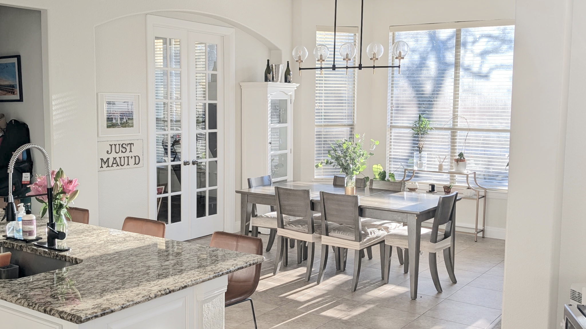 4205 Vail Divide Bee Cave, TX 78738 - Photo 8 of 28 A full-sized breakfast area with plenty of natural light, and hanging lights