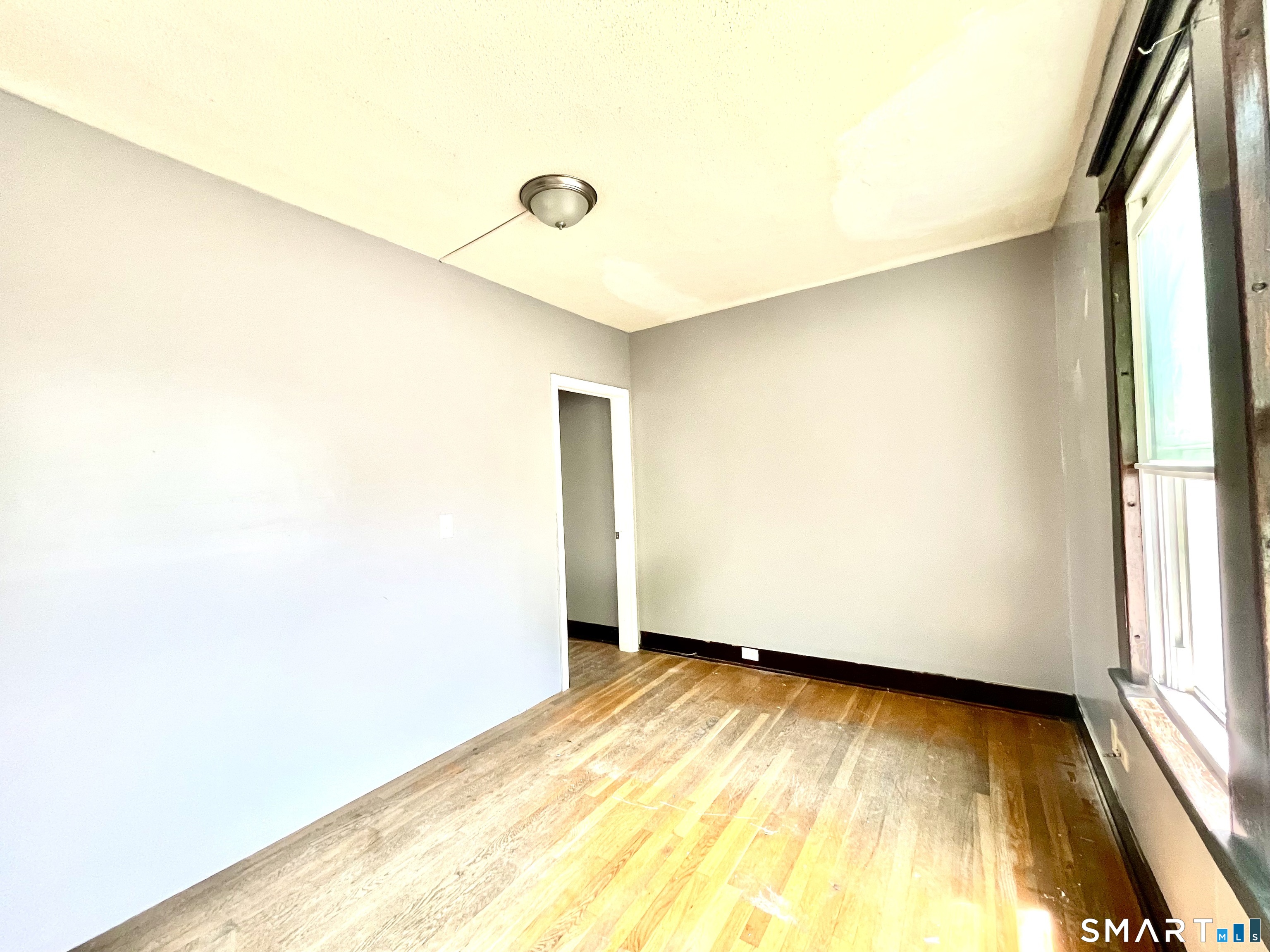 146 Charles Street, Unit 3 Waterbury, CT 06708 - Photo 13 of 20 a view of an empty room