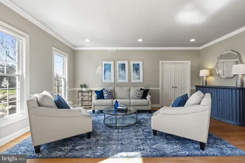 a living room with furniture and a couch