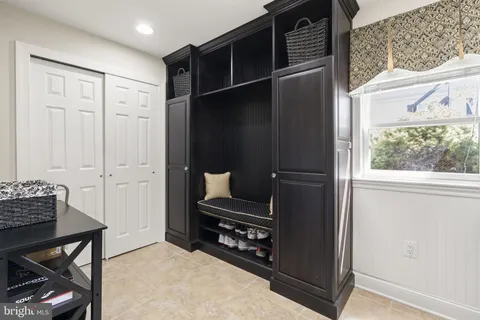 a view of kitchen island with granite countertop furniture and a window