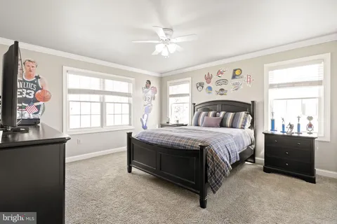 a bathroom with a double vanity sink and a bathtub