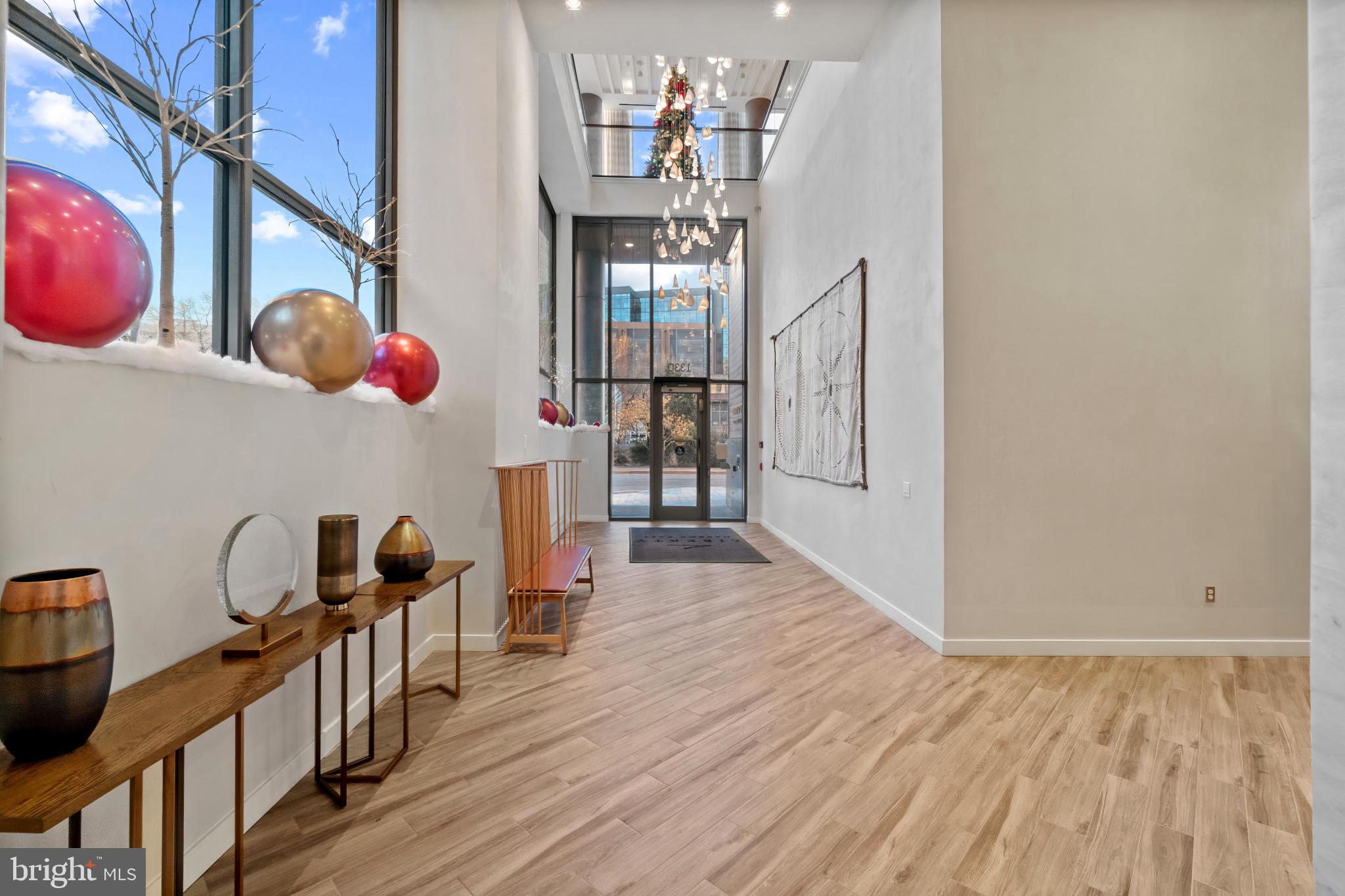 1330 Lancaster Street, Unit C602 Baltimore, MD 21231 - Photo 24 of 28 a view of entryway and hall with wooden floor
