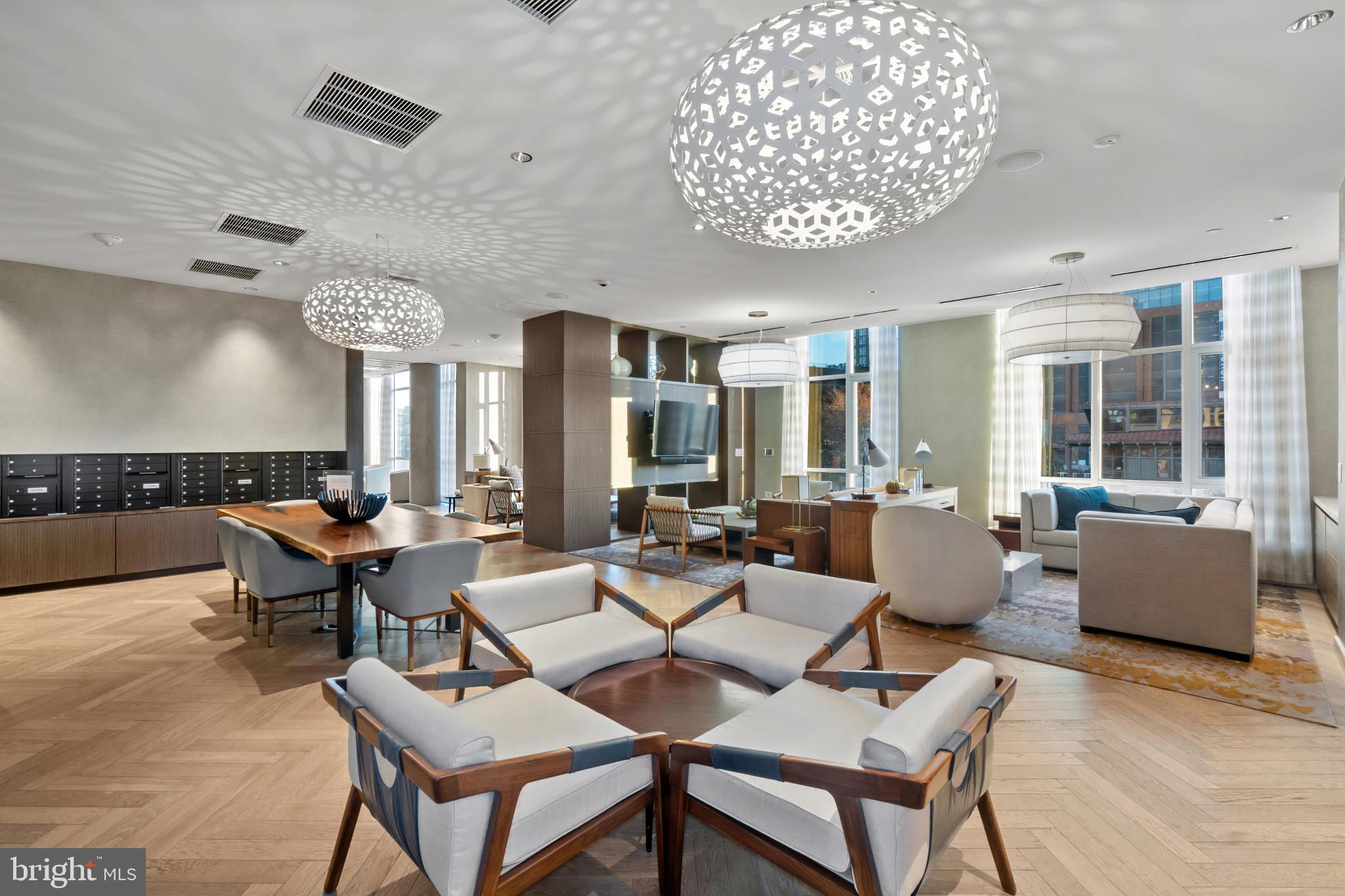 1330 Lancaster Street, Unit C602 Baltimore, MD 21231 - Photo 28 of 28 a living room with furniture and a large window