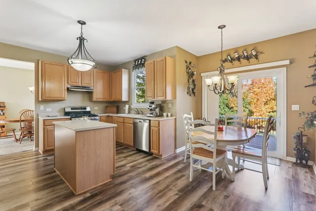a bedroom with a bed and a cabinet