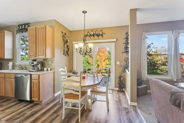 a bedroom with a bed and a flat tv screen