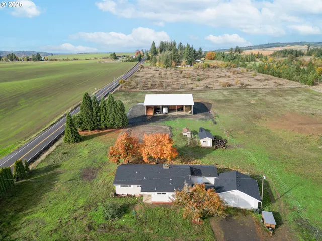 an aerial view of a house with a garden