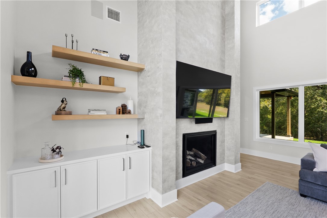 10717 Harvey Ranch Road College Station, TX 77845 - Photo 11 of 48 Micro-Cement Fireplace + 85" TV Upgrade