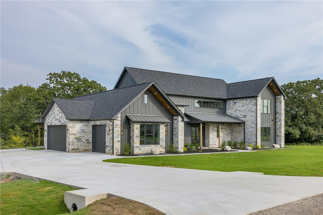 10717 Harvey Ranch Road College Station, TX 77845 - Photo 3 of 48 3-Car Garage w/ Oversized Driveway