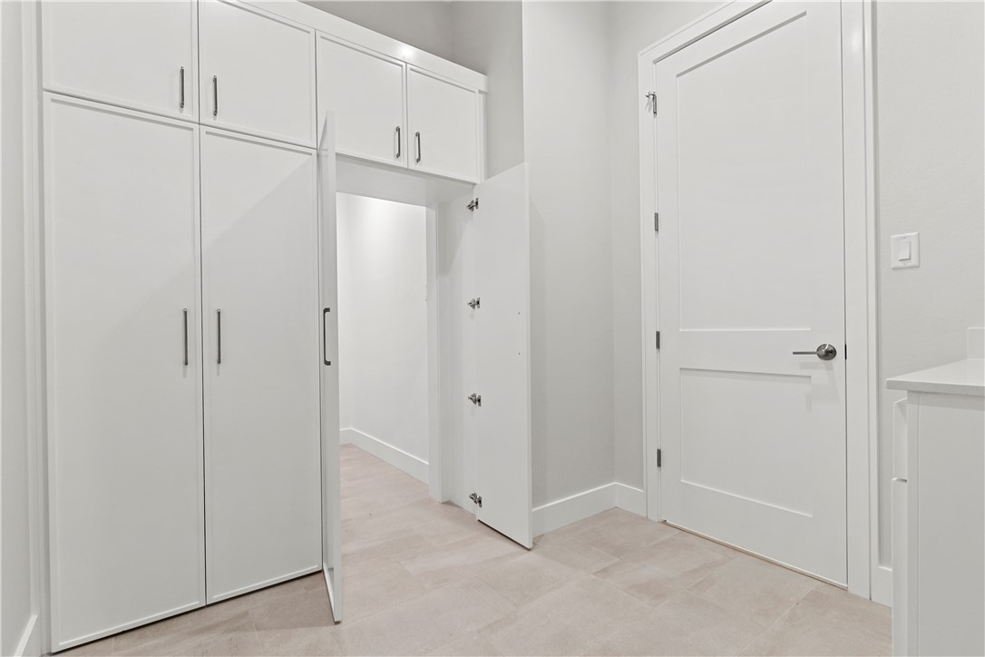 10717 Harvey Ranch Road College Station, TX 77845 - Photo 32 of 48 Hidden Room Access in Laundry Room