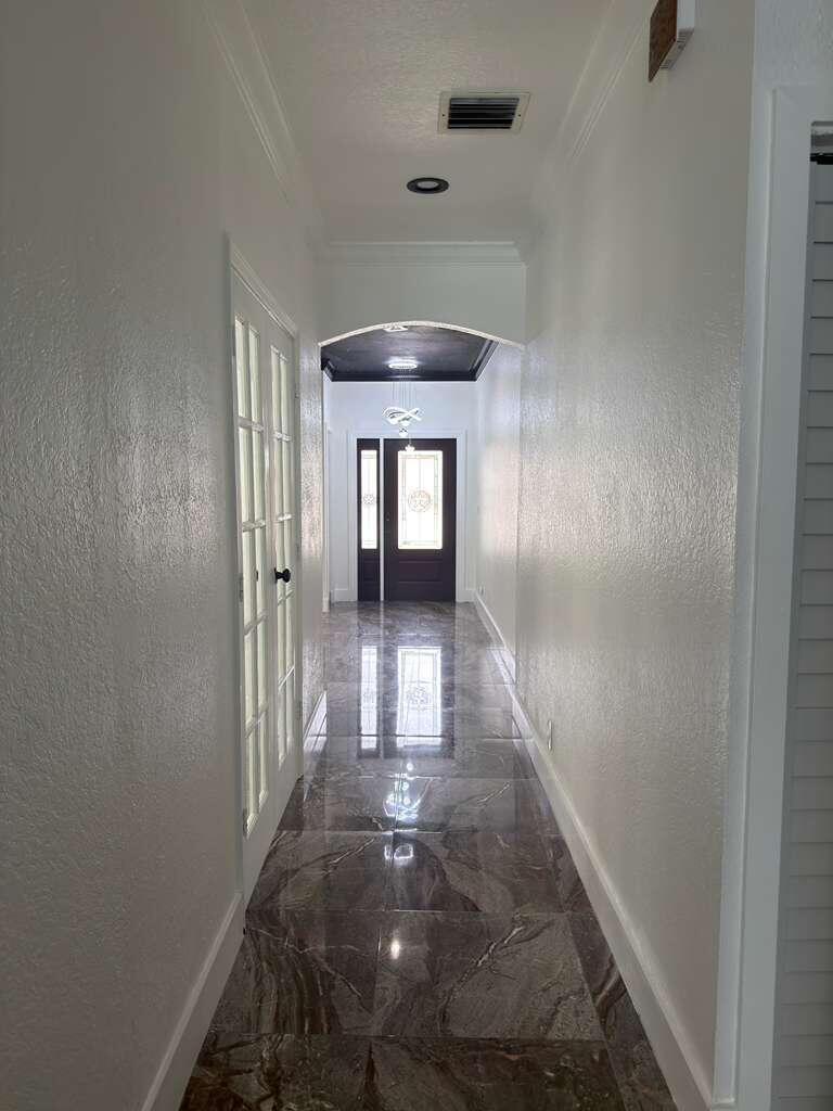 4572 Southwest 14th Street Deerfield Beach, FL 33442 - Photo 11 of 81 wooden floor in an empty room with a window