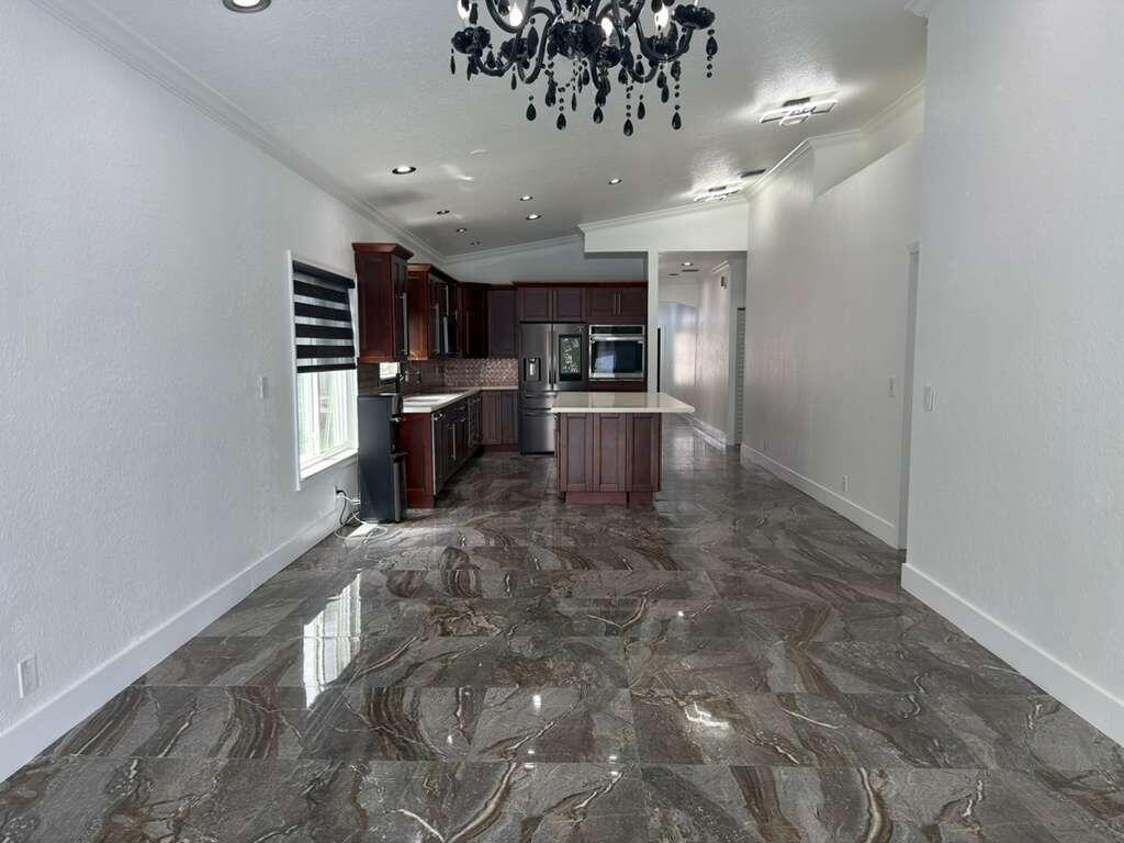 4572 Southwest 14th Street Deerfield Beach, FL 33442 - Photo 21 of 81 a view of a kitchen with a sink and cabinets