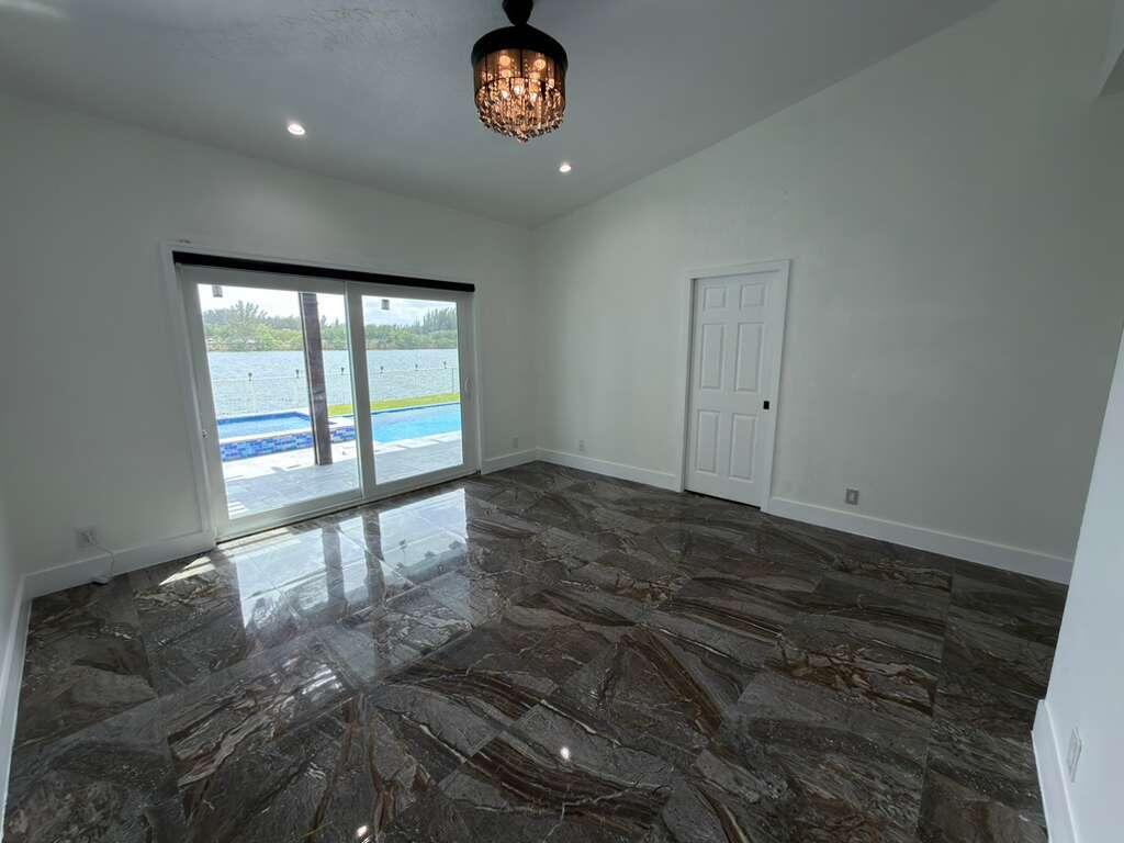 4572 Southwest 14th Street Deerfield Beach, FL 33442 - Photo 26 of 81 a view of an empty room and window