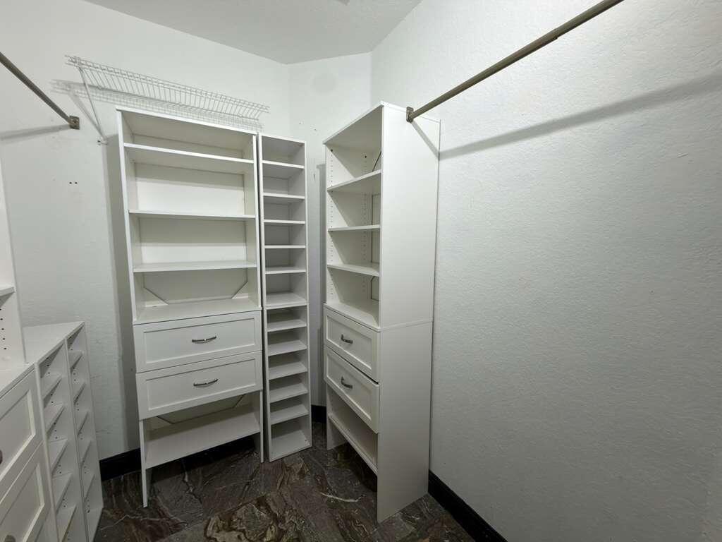 4572 Southwest 14th Street Deerfield Beach, FL 33442 - Photo 30 of 81 a view of walk in closet