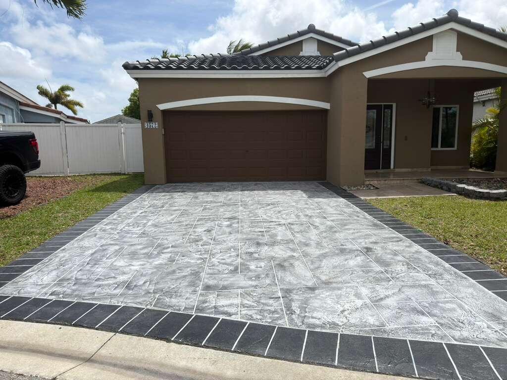 4572 Southwest 14th Street Deerfield Beach, FL 33442 - Photo 4 of 81 a front view of a house with a yard