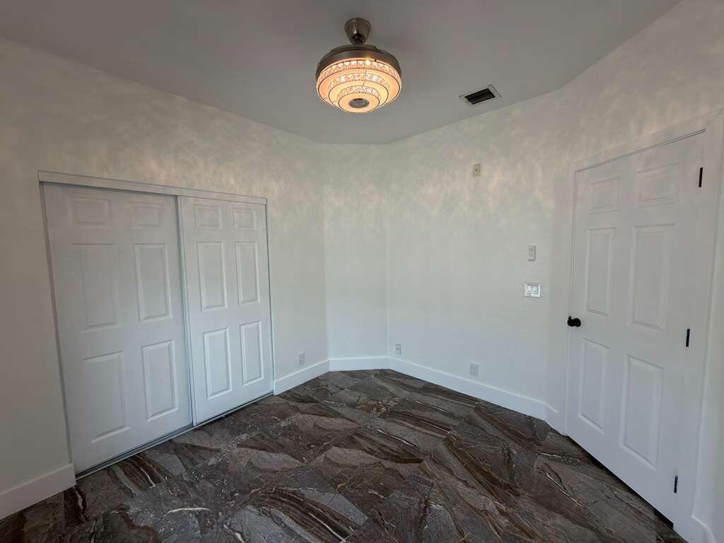 4572 Southwest 14th Street Deerfield Beach, FL 33442 - Photo 46 of 81 a view of an empty room
