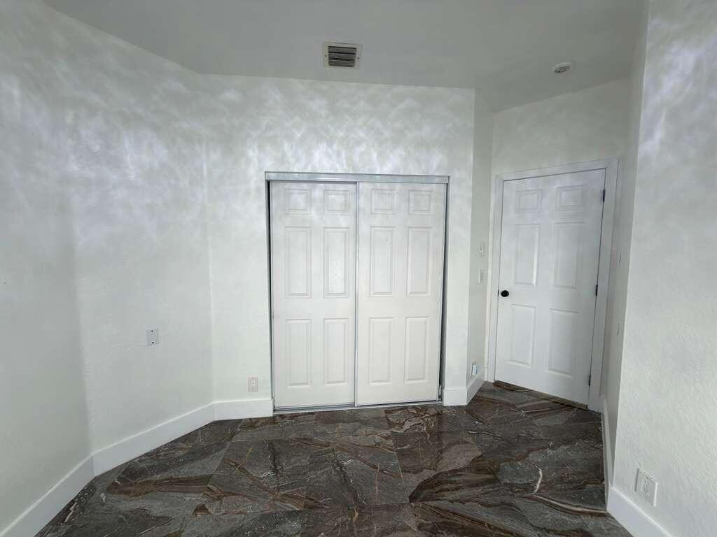 4572 Southwest 14th Street Deerfield Beach, FL 33442 - Photo 54 of 81 a view of an empty room