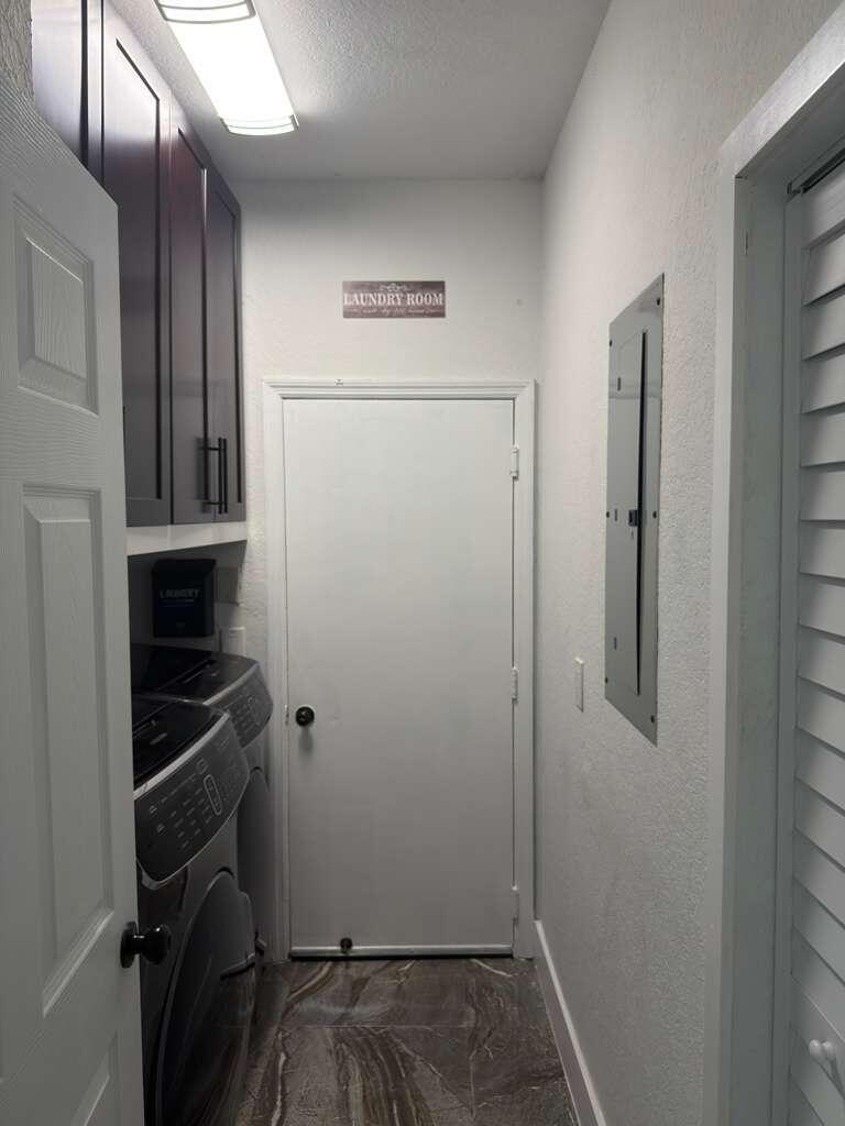 4572 Southwest 14th Street Deerfield Beach, FL 33442 - Photo 56 of 81 a view of storage and utility room with refrigerator
