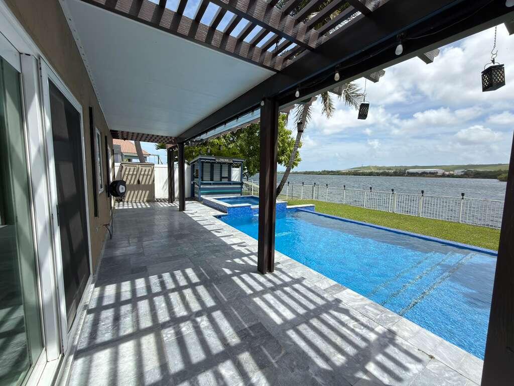 4572 Southwest 14th Street Deerfield Beach, FL 33442 - Photo 70 of 81 a view of swimming pool with seating area