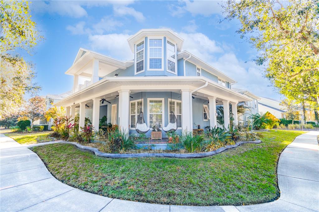 3305 Schoolhouse Road St. Cloud, FL 34773 - Photo 1 of 83 a front view of a house with garden