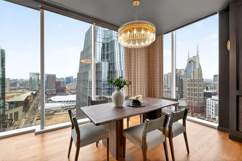 a water fountain sitting in the middle of a city