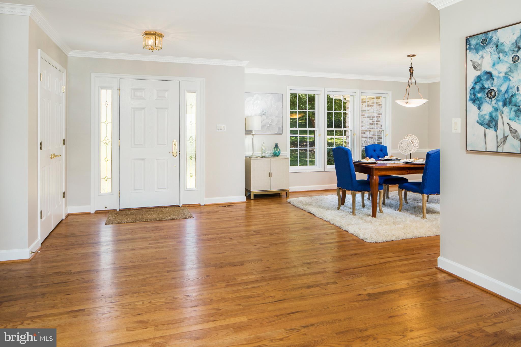 7408 Round Hill Road Frederick, MD 21702 - Photo 9 of 52 Foyer/View of Dining Room