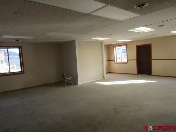 an empty room with windows