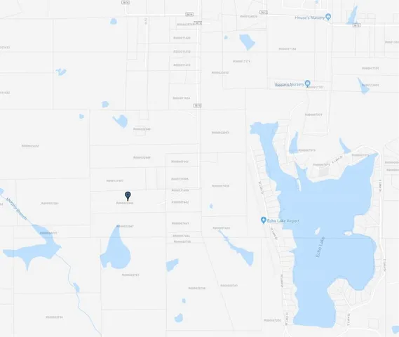 a view of balcony with small yard