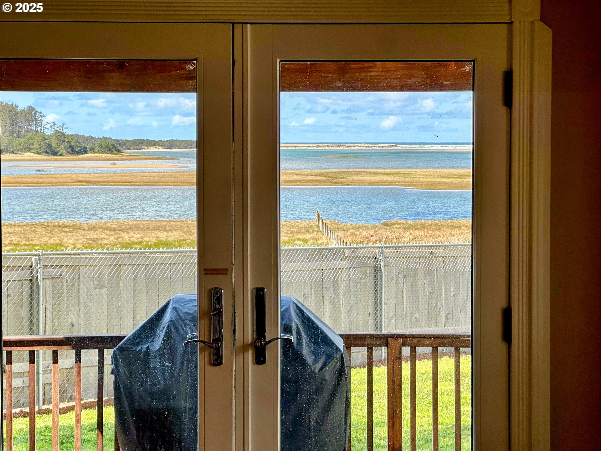 26230 Sandlake Road Cloverdale, OR 97112 - Photo 18 of 44 a view of a balcony with an ocean view