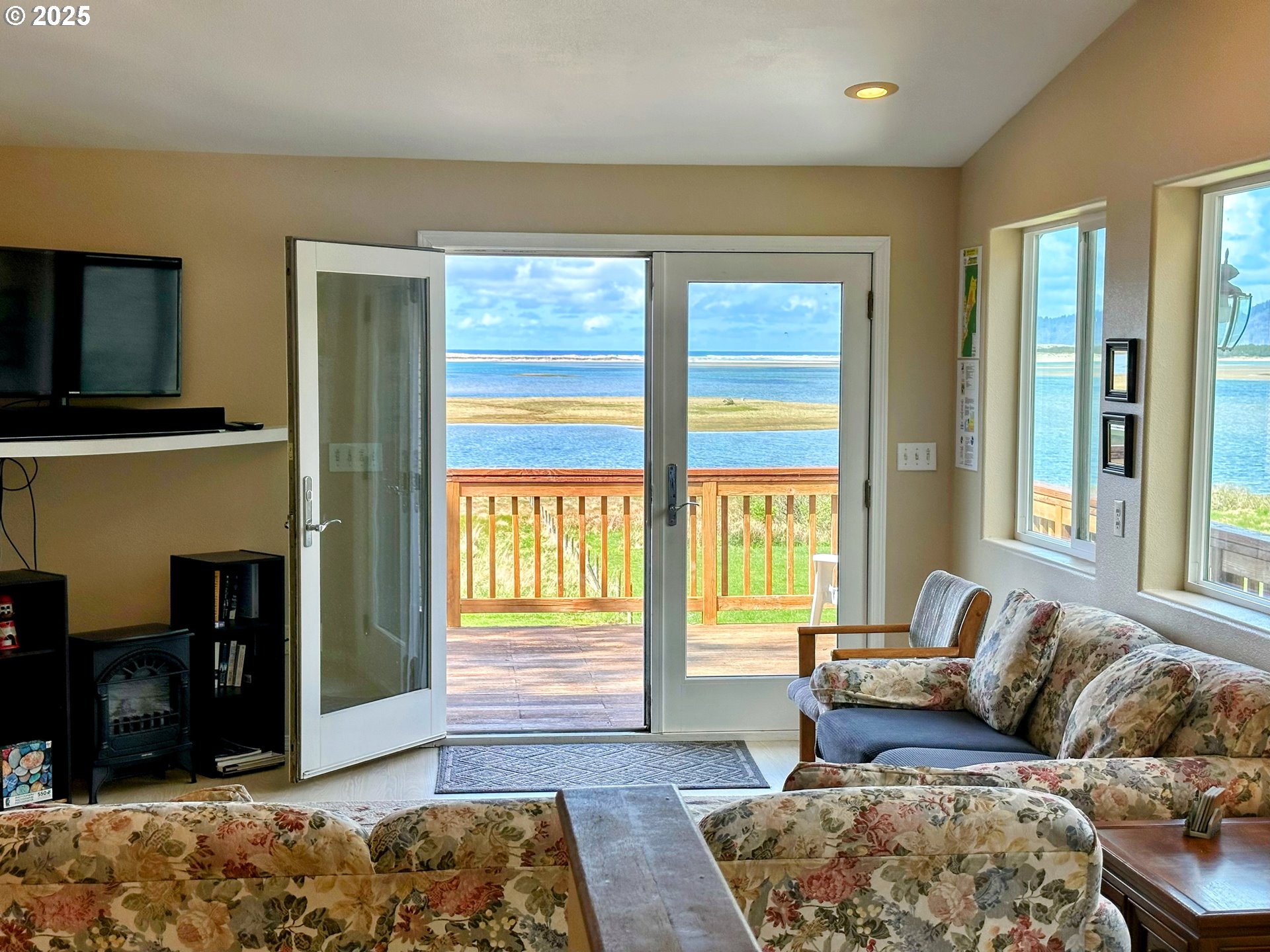 26230 Sandlake Road Cloverdale, OR 97112 - Photo 31 of 44 a living room with furniture and a window