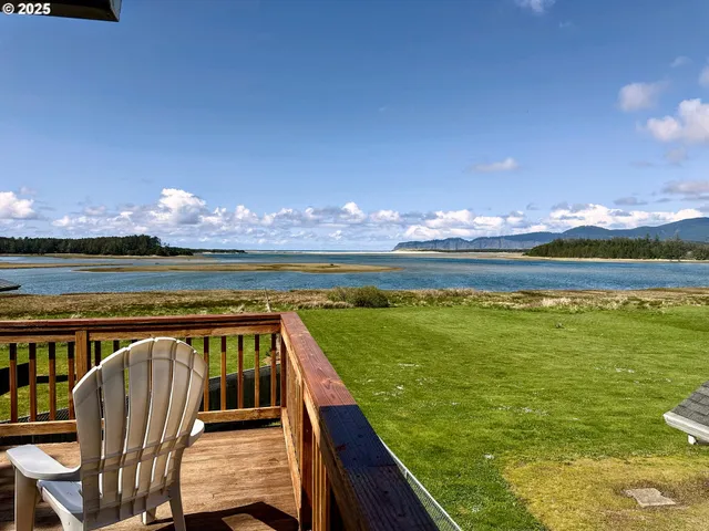 a view of swimming pool with outdoor seating