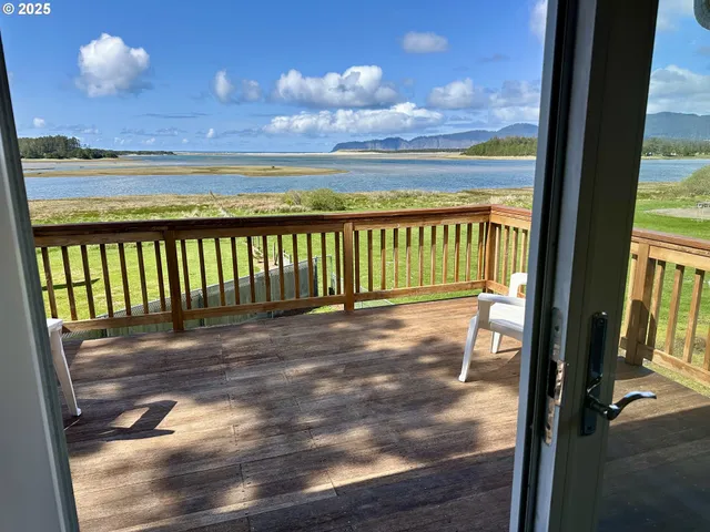 a view of balcony with furniture